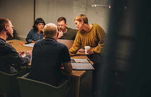 Business professionals in meeting room