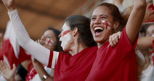 English football supporters celebrating a championship win