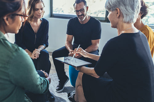 Multi-ethnic staff having a group discussion
