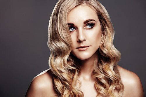 Beautiful blond woman with curly hair