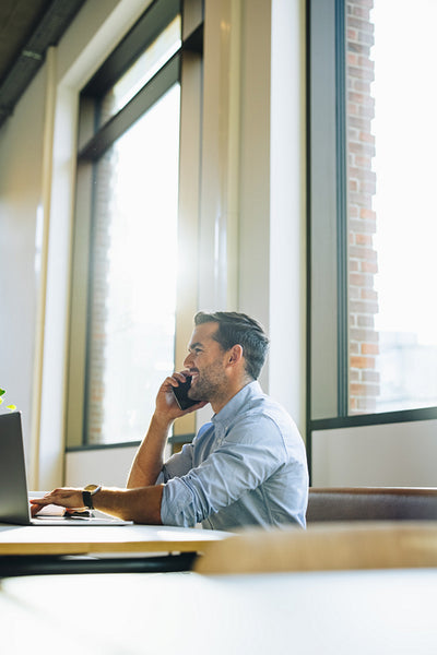 Businessman speaking on cell phone