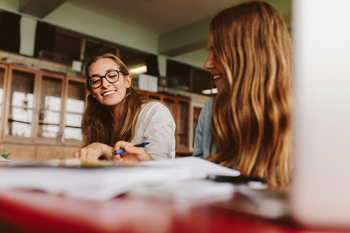 Lecturer helping a student in studies