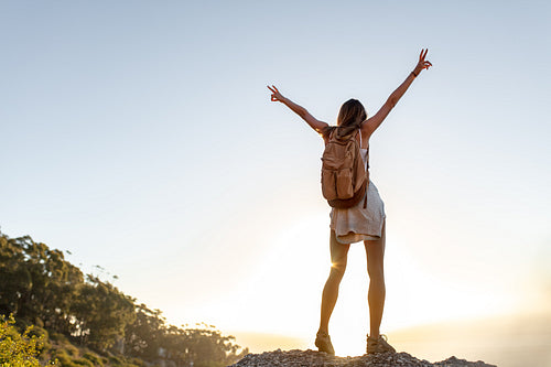 Female hiker enjoying being on top of the mountain