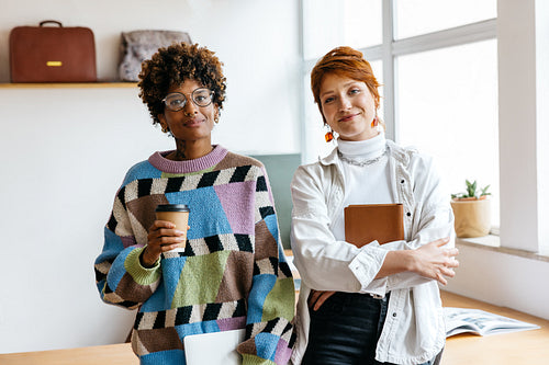 Confident freelance colleagues in a bright co-working space