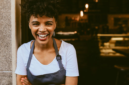 Cafe owner standing in the doorway
