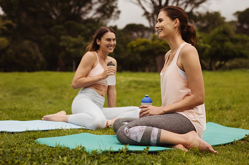 Women taking a break during fitness training