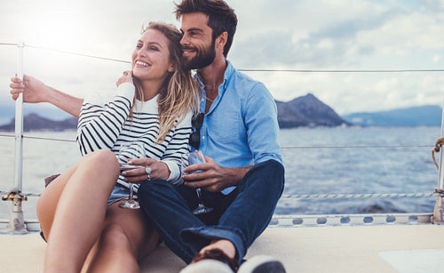Loving couple on a romantic getaway on a boat