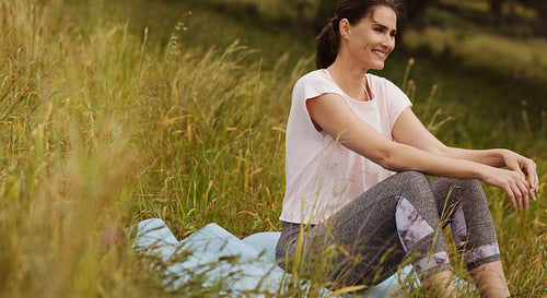 Woman relaxing in the meadows