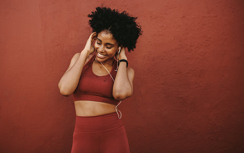 Female listening to music after workout