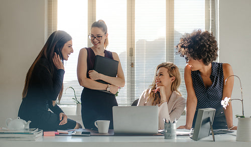 Diverse group of women having a break in office