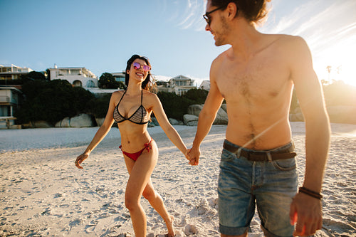 Happy couple in love on beach summer vacation