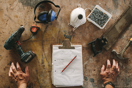 Carpenter workbench with tools.