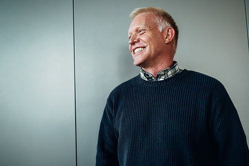 Happy senior male professional