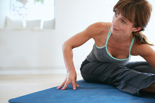 Fitness woman practicing yoga