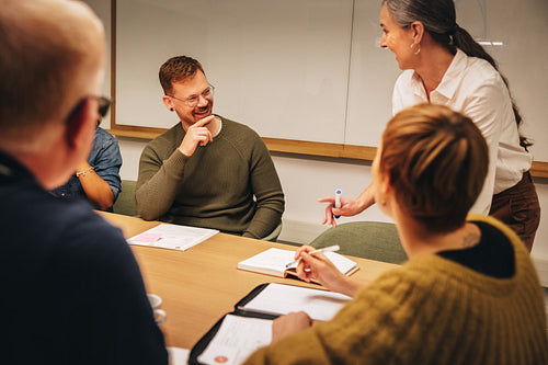 Business team smiling during a meeting in office