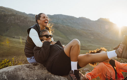 Friends laughing together in nature