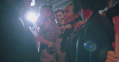 Angry protestors protesting in front of police force
