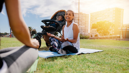 Woman doing yoga sitting in park