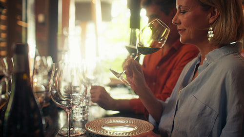 Couple enjoys a private wine tasting experience in a luxury cellar