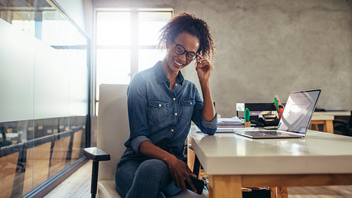 Smiling woman entrepreneur
