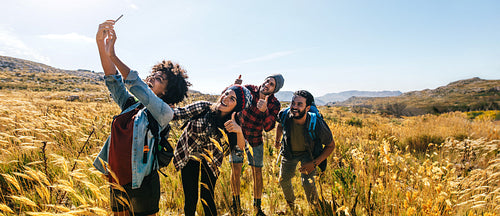Friends taking selfie on hiking trip