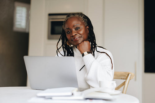 Senior businesswoman working from home