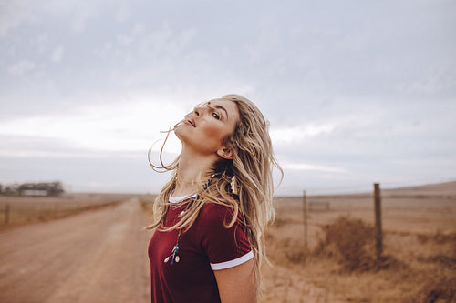 Attractive woman on country road