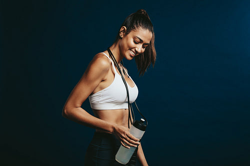 Athletic woman relaxing after workout