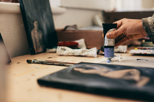 Female artist hands with colors