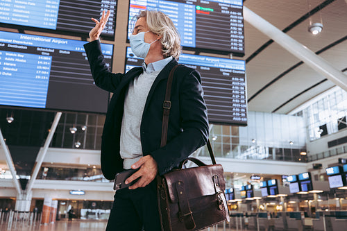 Business traveler at airport during pandemic
