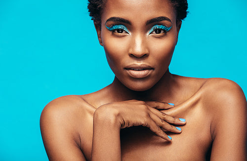 Sensual african woman wearing vivid makeup