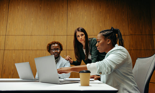 Business team in a meeting discussing audit strategies