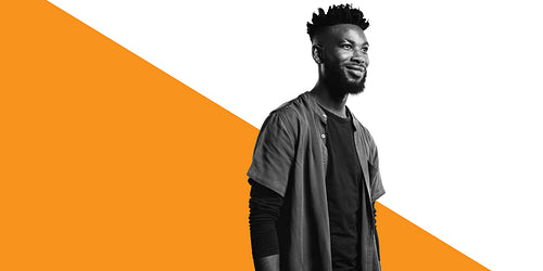 Happy african man in creative hair style