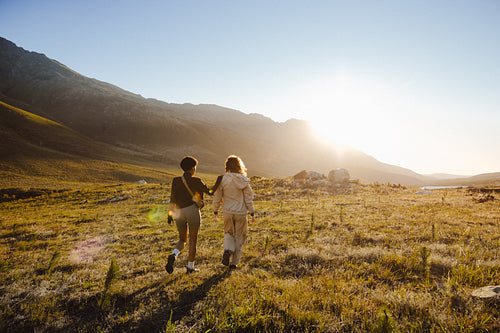 Couple hiking in scenic mountain landscape