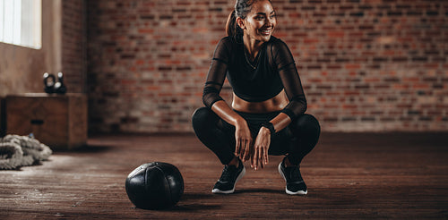 Fitness woman taking break after at gym