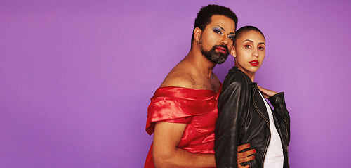 Drag queen with androgynous female togehter