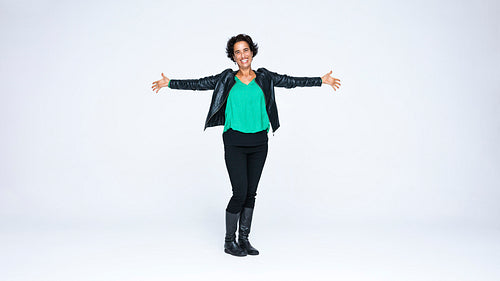 Happy woman in jacket and boots