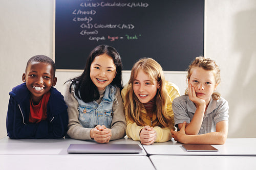 Inspiring future tech leaders: Diverse kids attending a coding class together