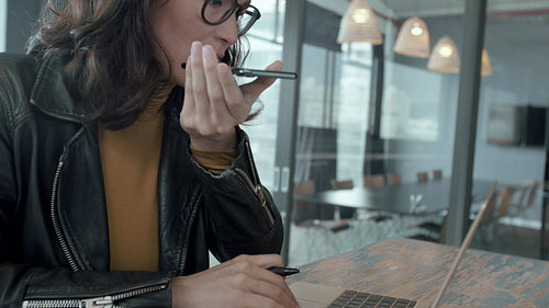 Business woman working at her desk