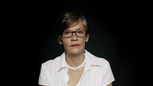 Serious looking senior woman