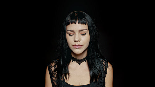 Gothic woman with eyes closed