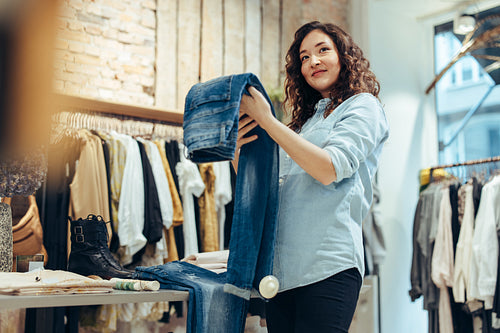 Woman shopping in clothing store