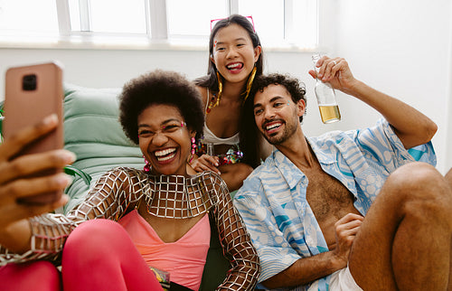 Friends celebrate colorful party at home