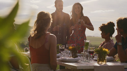 Friends celebrating with wine