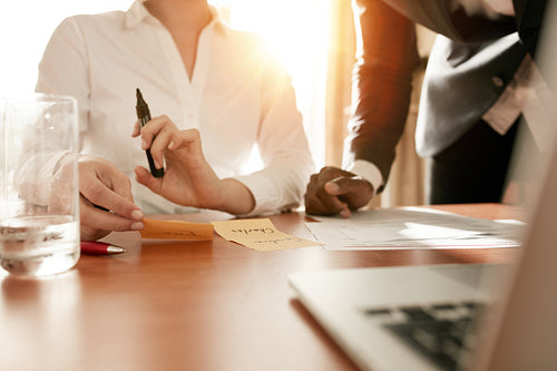 Businesspeople doing manpower planning for their new project