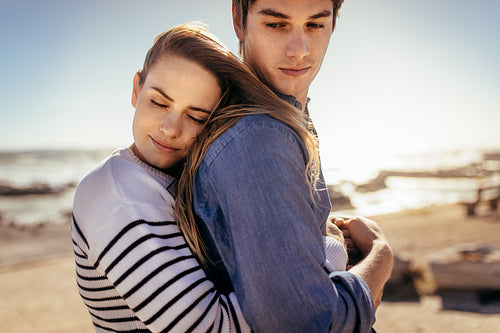 Romantic couple on standing near the sea
