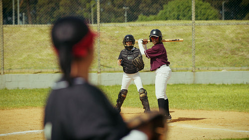 Baseball batter misses a pitch
