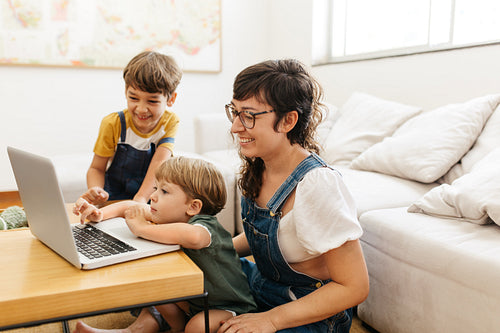 Young family using laptop