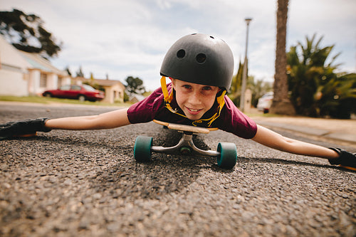Boy playing on his skateboard