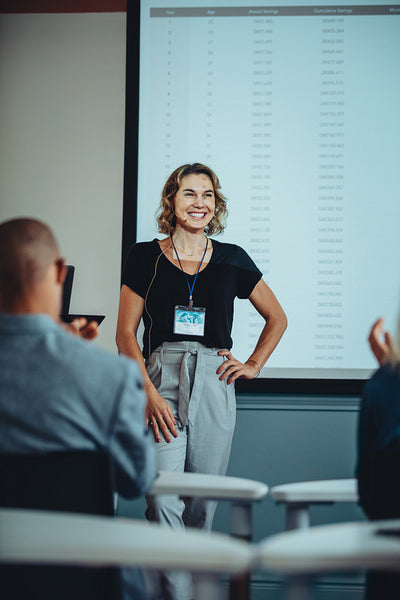 Presenter getting applause at conference